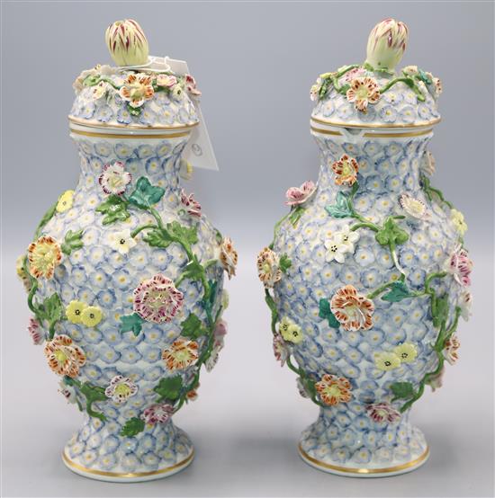 Pair floral encrusted vases